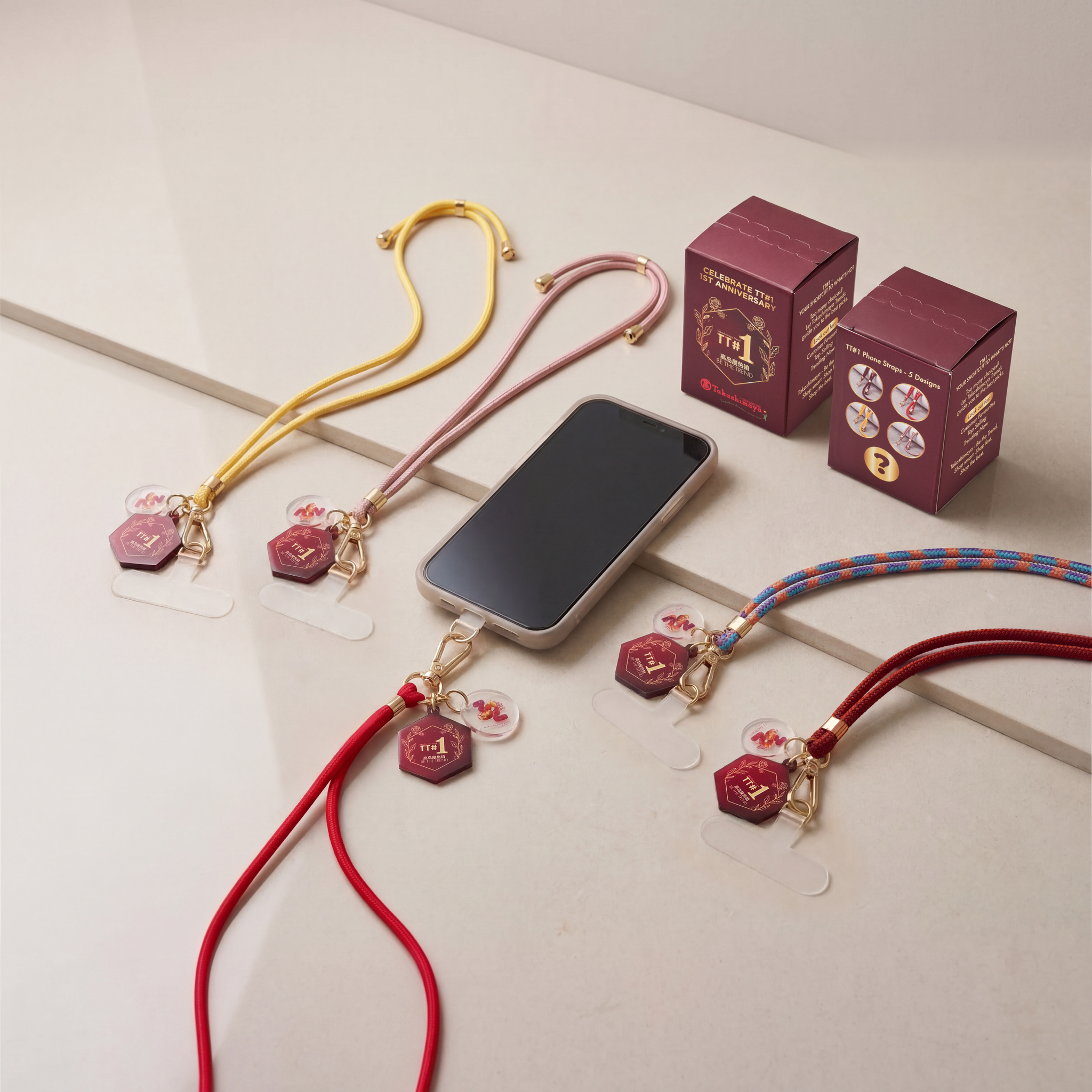 Phone Straps With Mystery Charms — customised gift